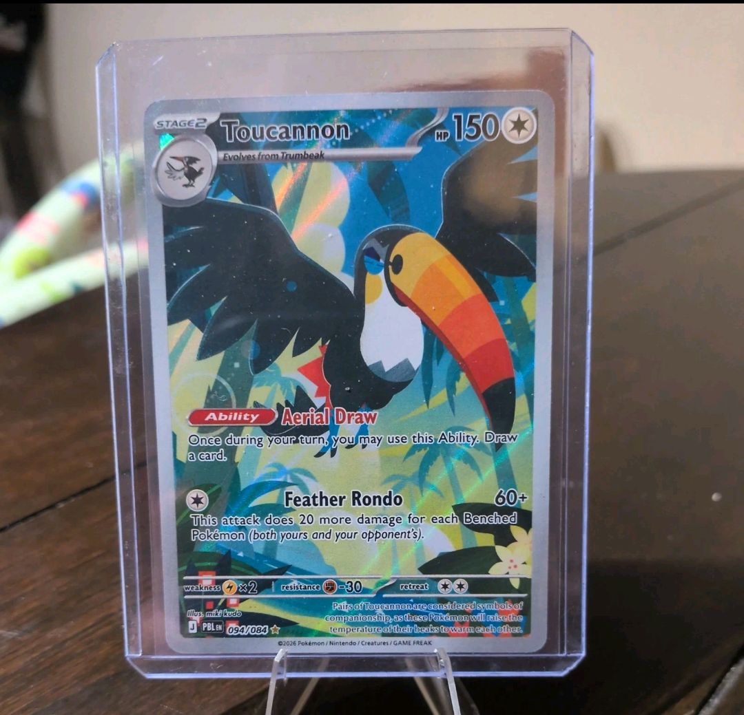 Toucannon 094/084 Illustration Rare ME05: Pitch Black Holo NM